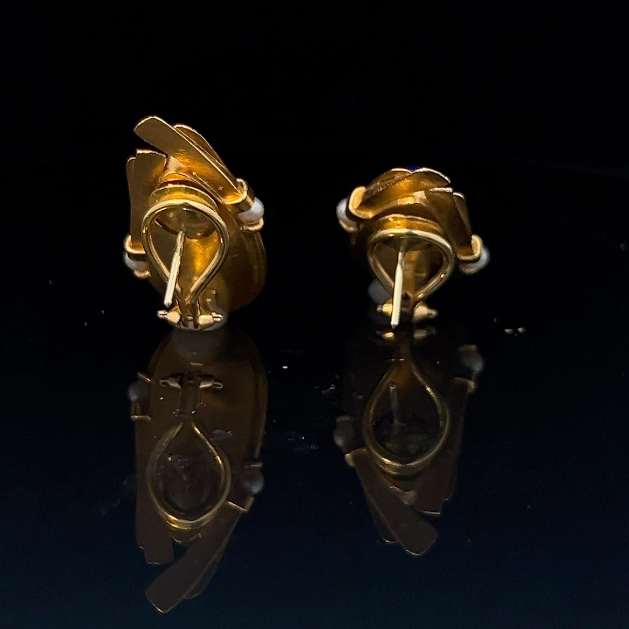 A pair of 18k yellow gold, lapis lazuli and pearl earrings by Erté. 4