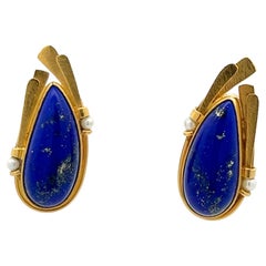 A pair of 18k yellow gold, lapis lazuli and pearl earrings by Erté.