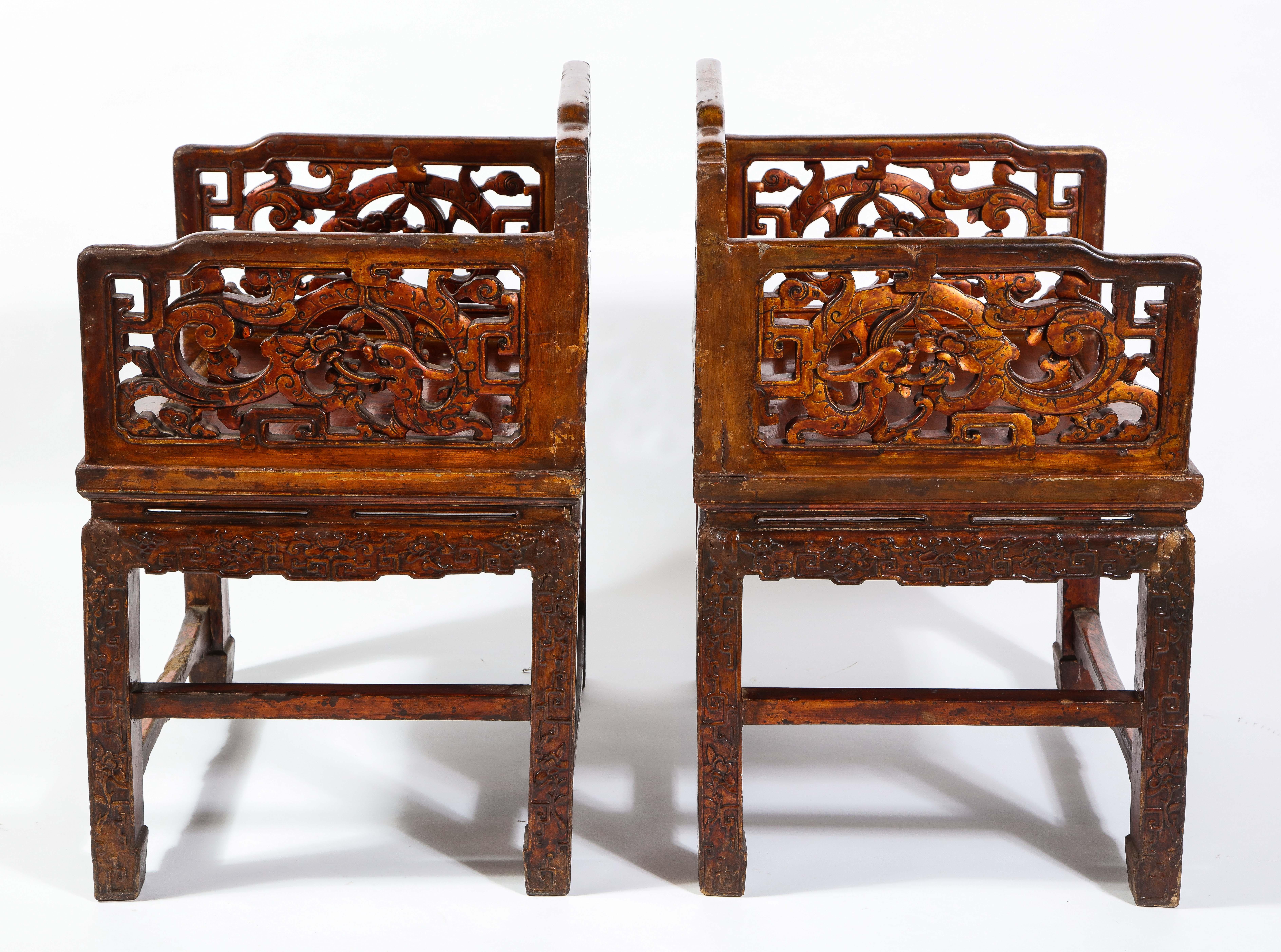 Hand-Carved Pair of 19th Century Chinese Lacquered Hardwood Open Work Throne Chairs