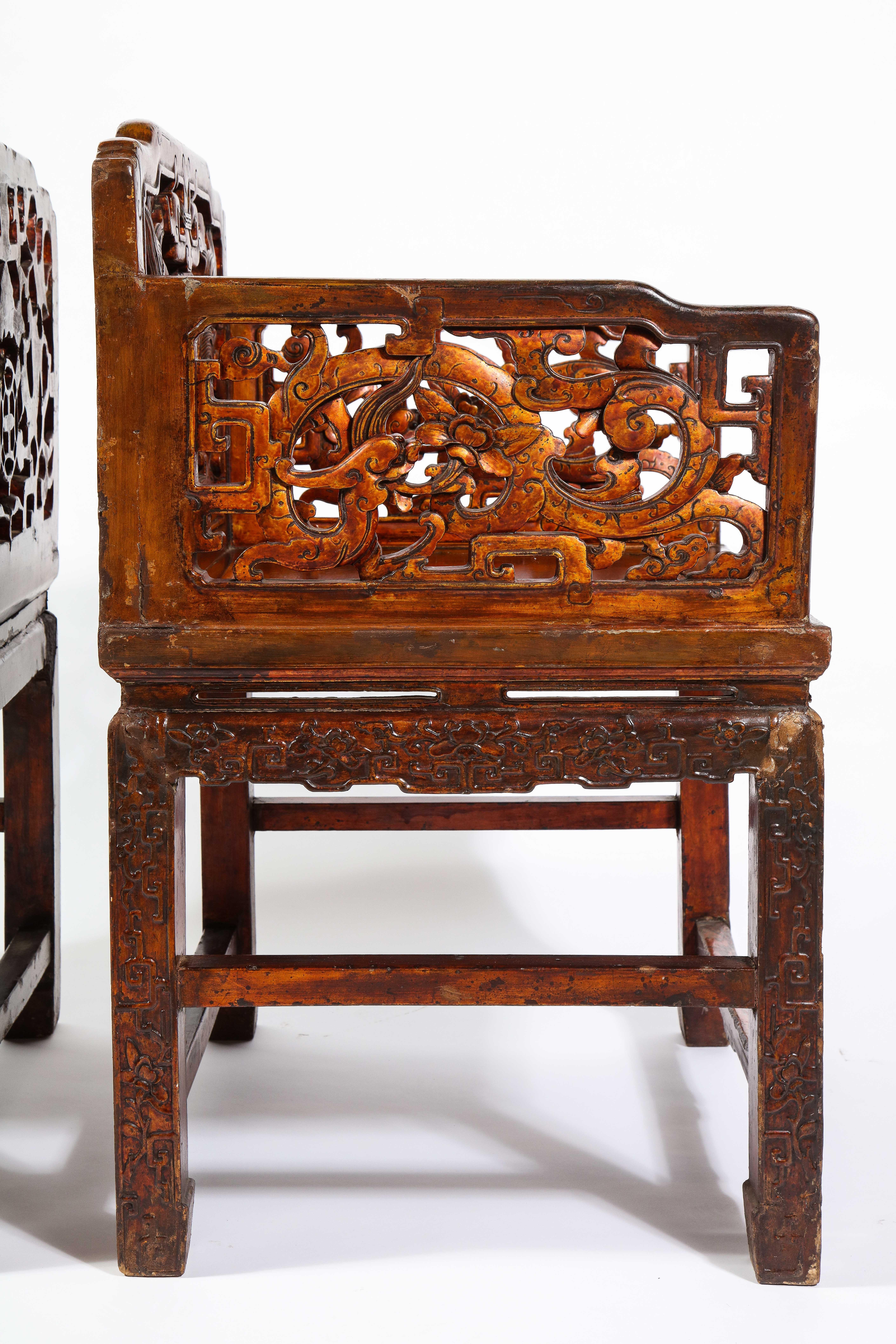 Pair of 19th Century Chinese Lacquered Hardwood Open Work Throne Chairs In Fair Condition In New York, NY