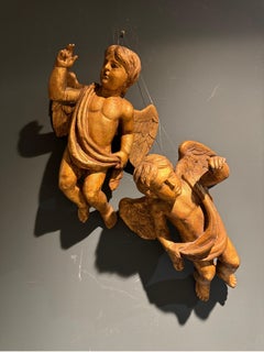 A pair of 18th century Austrian winged cherubs