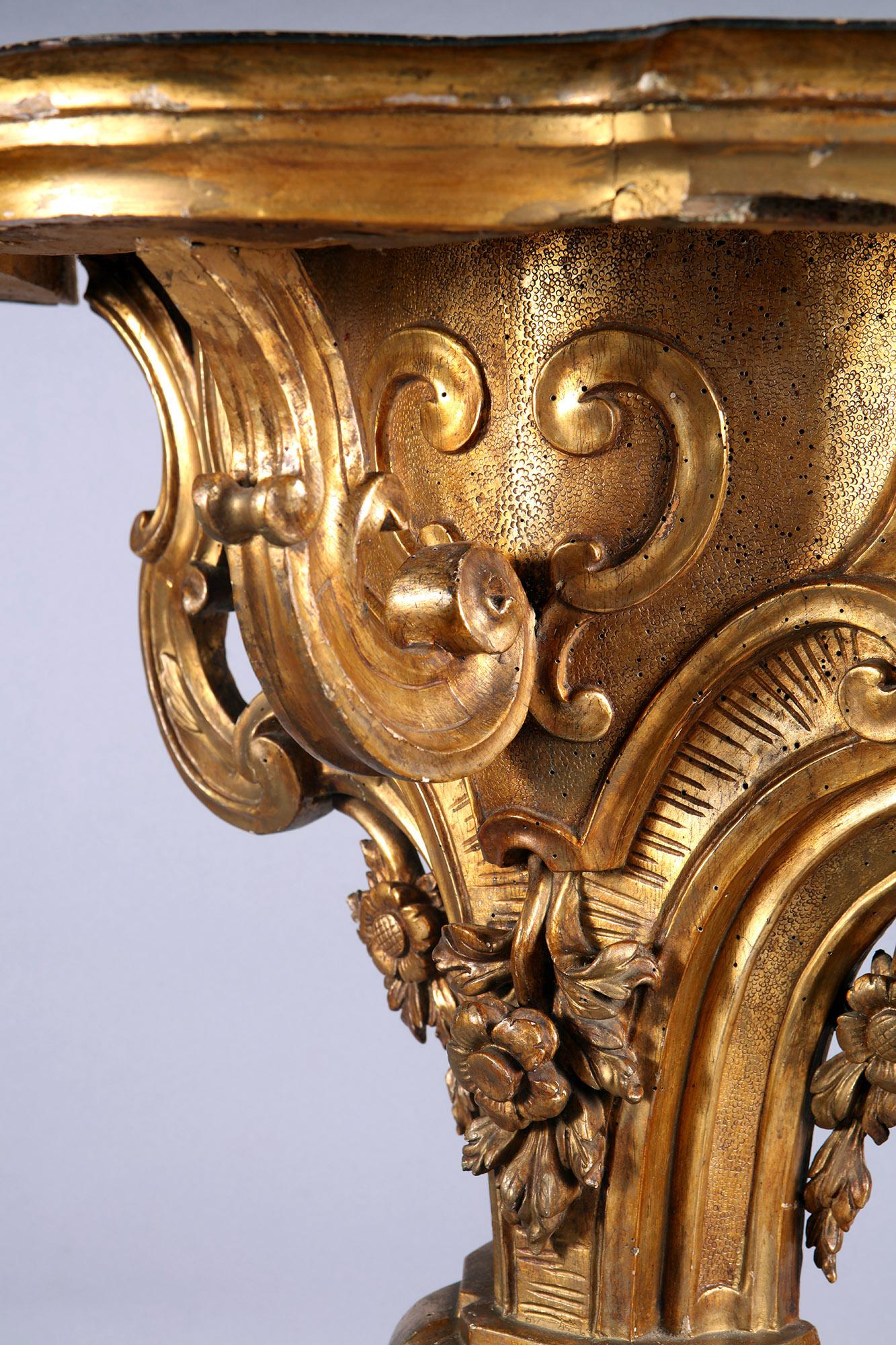 Carved A pair of 18th century Italian carved gilt wood console tables  For Sale