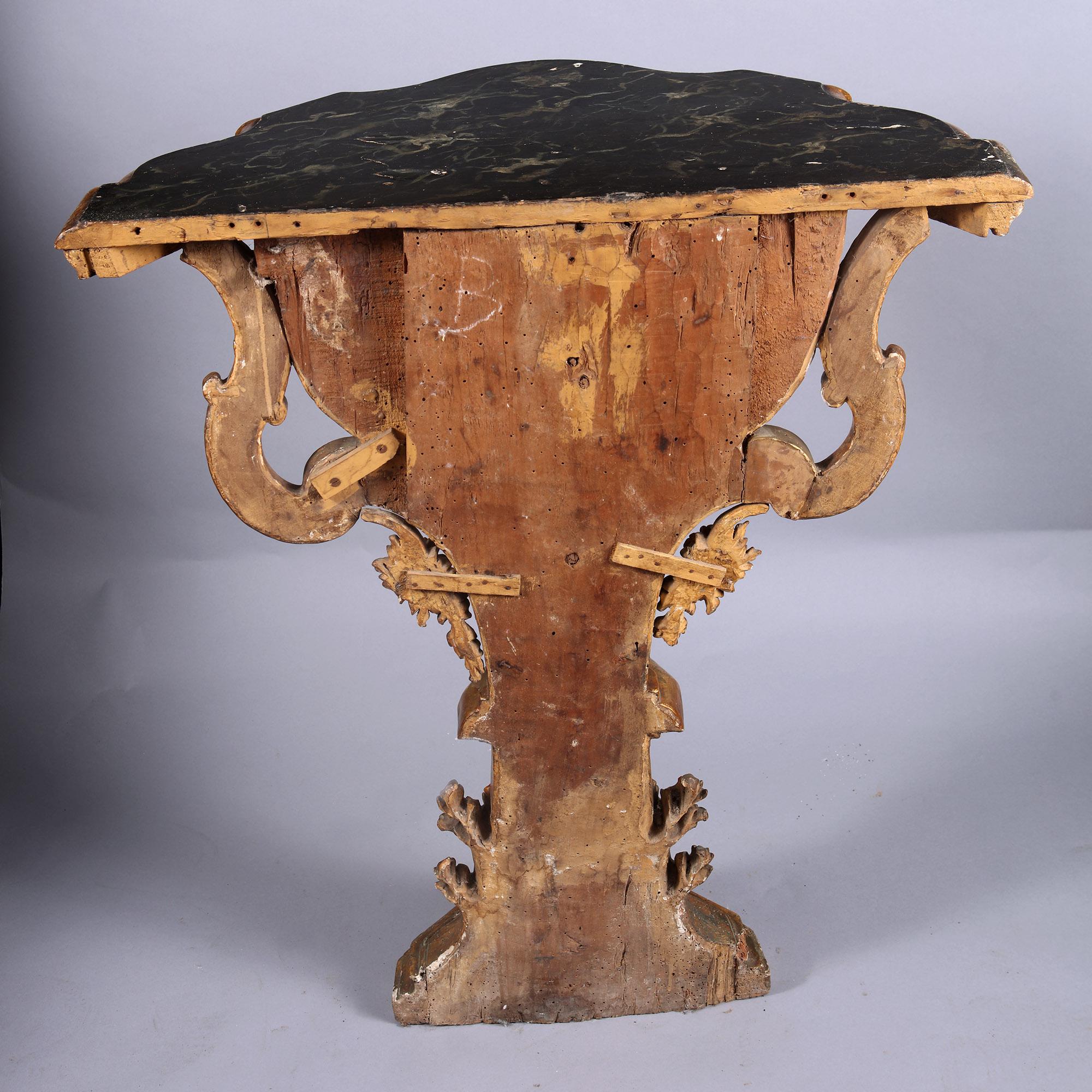 18th Century and Earlier A pair of 18th century Italian carved gilt wood console tables  For Sale