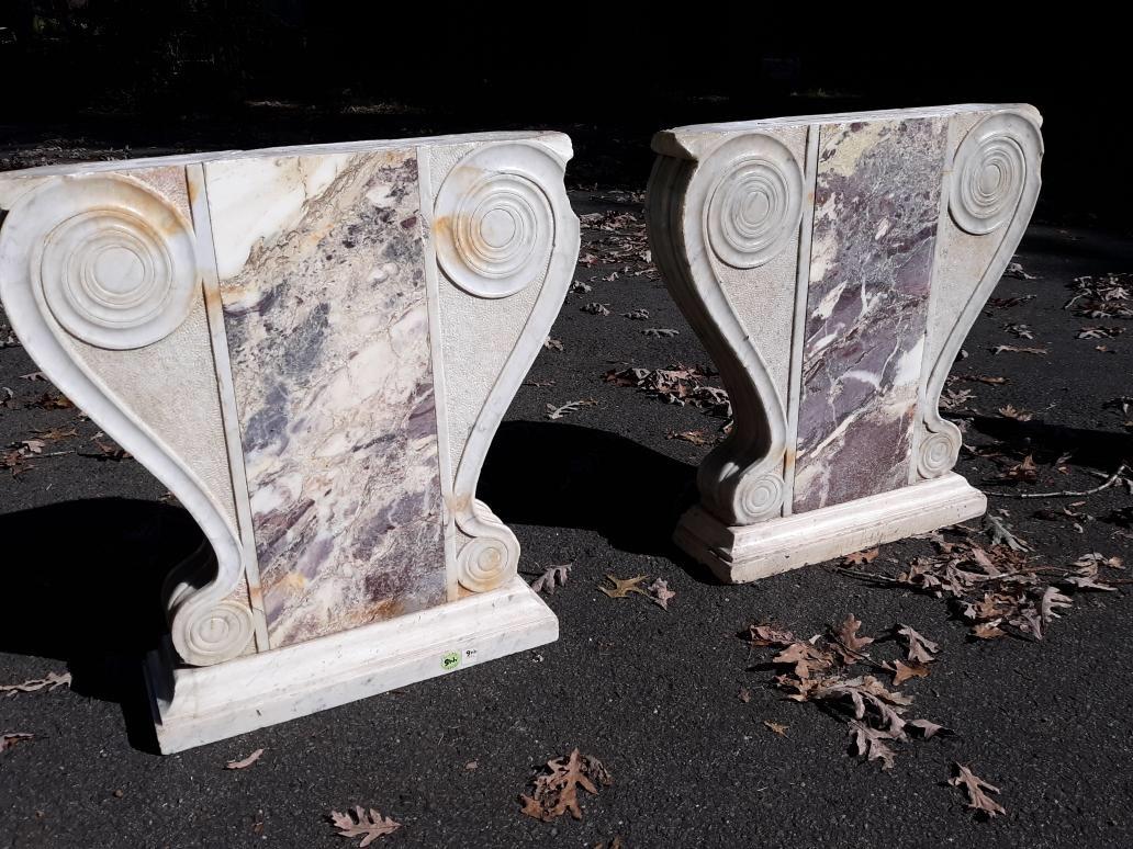 A fabulous pair of hand carve marble table bases from the 18th Century Italy. Each measures 26.5 high, 26 inches deep and 7.25 inches thick. Original weathered condition with some losses and one bigger chip, see pictures. This bas can be topped with
