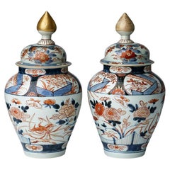 Pair of 18th Century Japanese Imari Urns with Lids