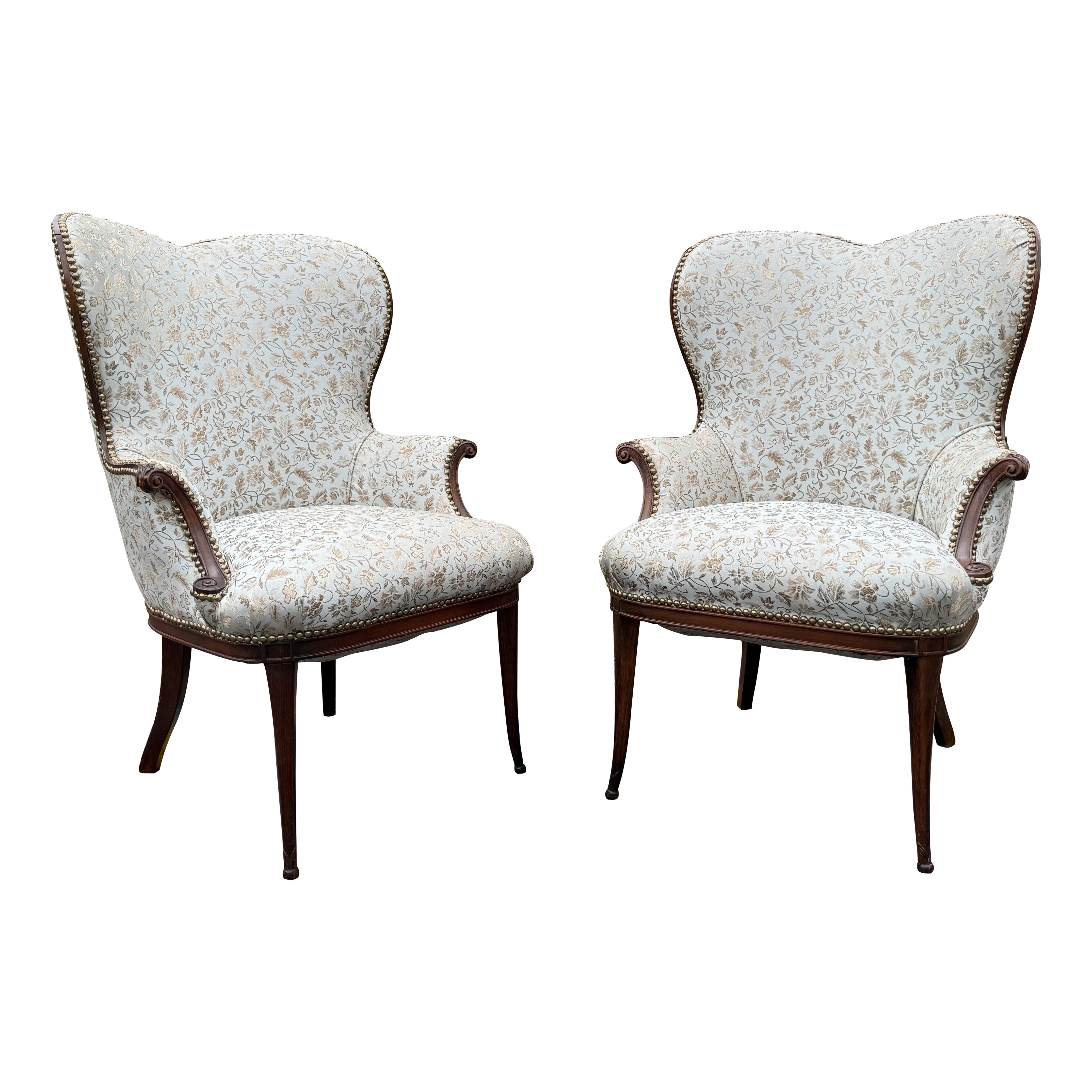 A pair of 1920s French Blue Upholstered Art Deco Fireside Chairs