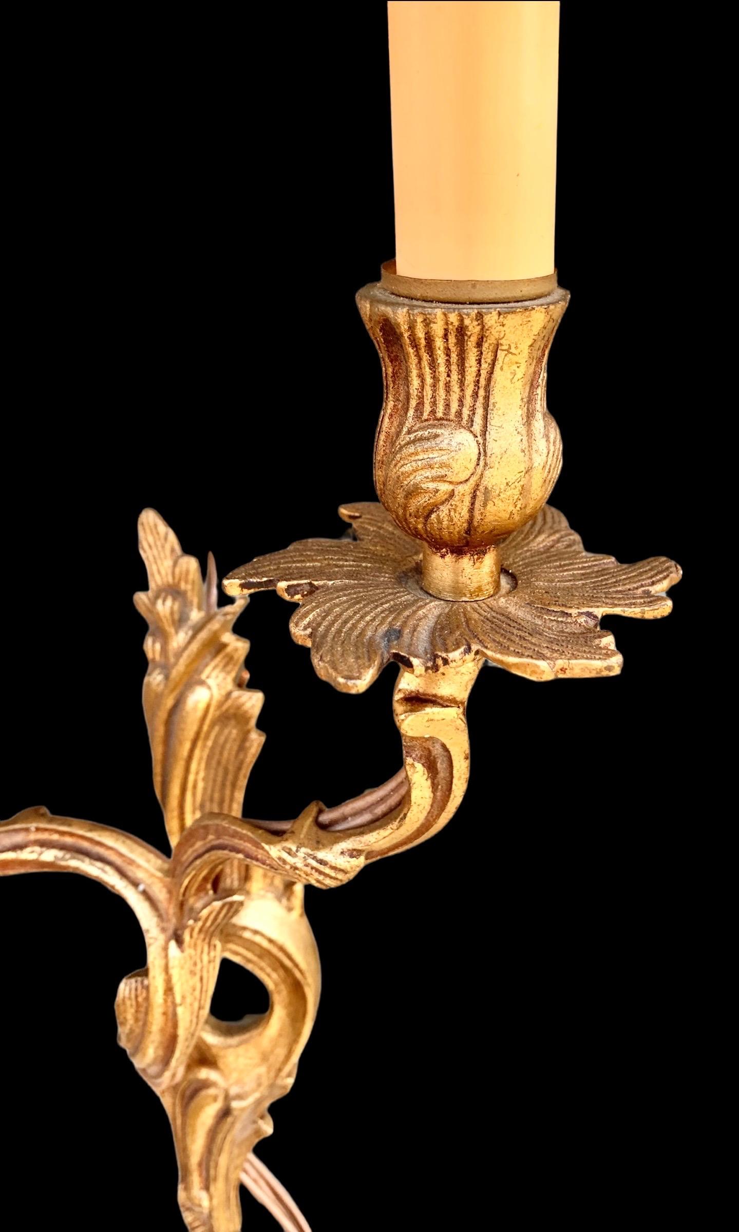 Gilt Pair of 1920's Gilded Bronze Louis XV Style Electrified Wall Sconces, Spain