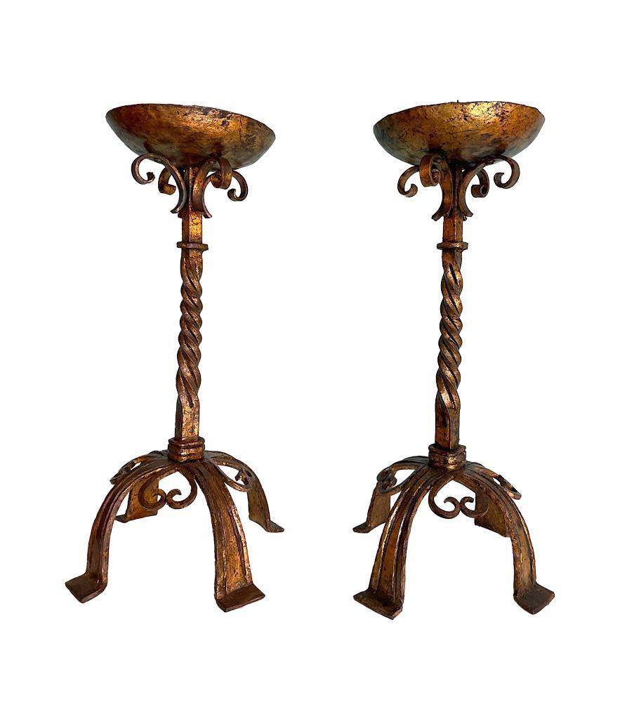 Gilt A pair of 1920s Spanish ecclesiastical gilt wrought iron candle sticks For Sale