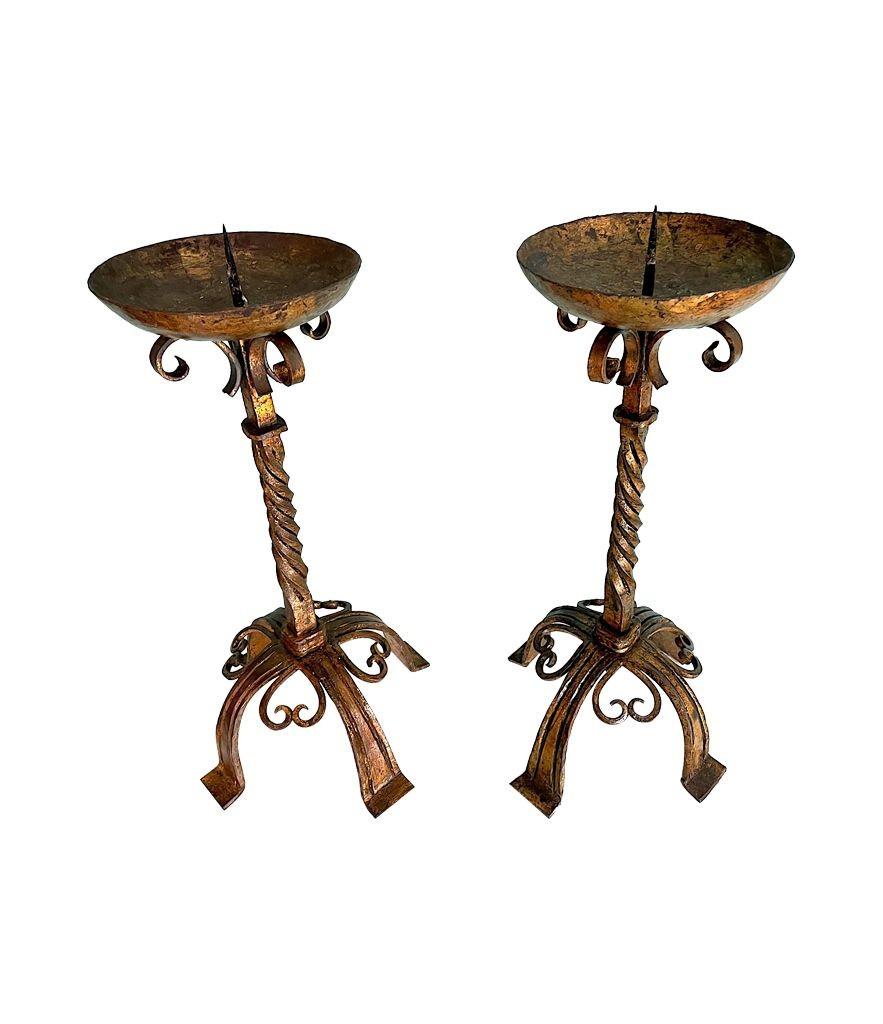 Wrought Iron A pair of 1920s Spanish ecclesiastical gilt wrought iron candle sticks For Sale