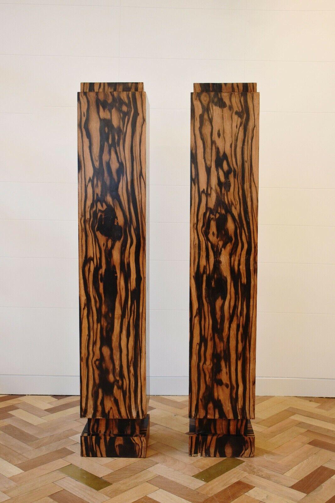 A pair of beautiful and very rare Art Deco calamander wood plinths, c.1930. 

This pair of plinths comprise of a stepped top and base, veneered on all sides.