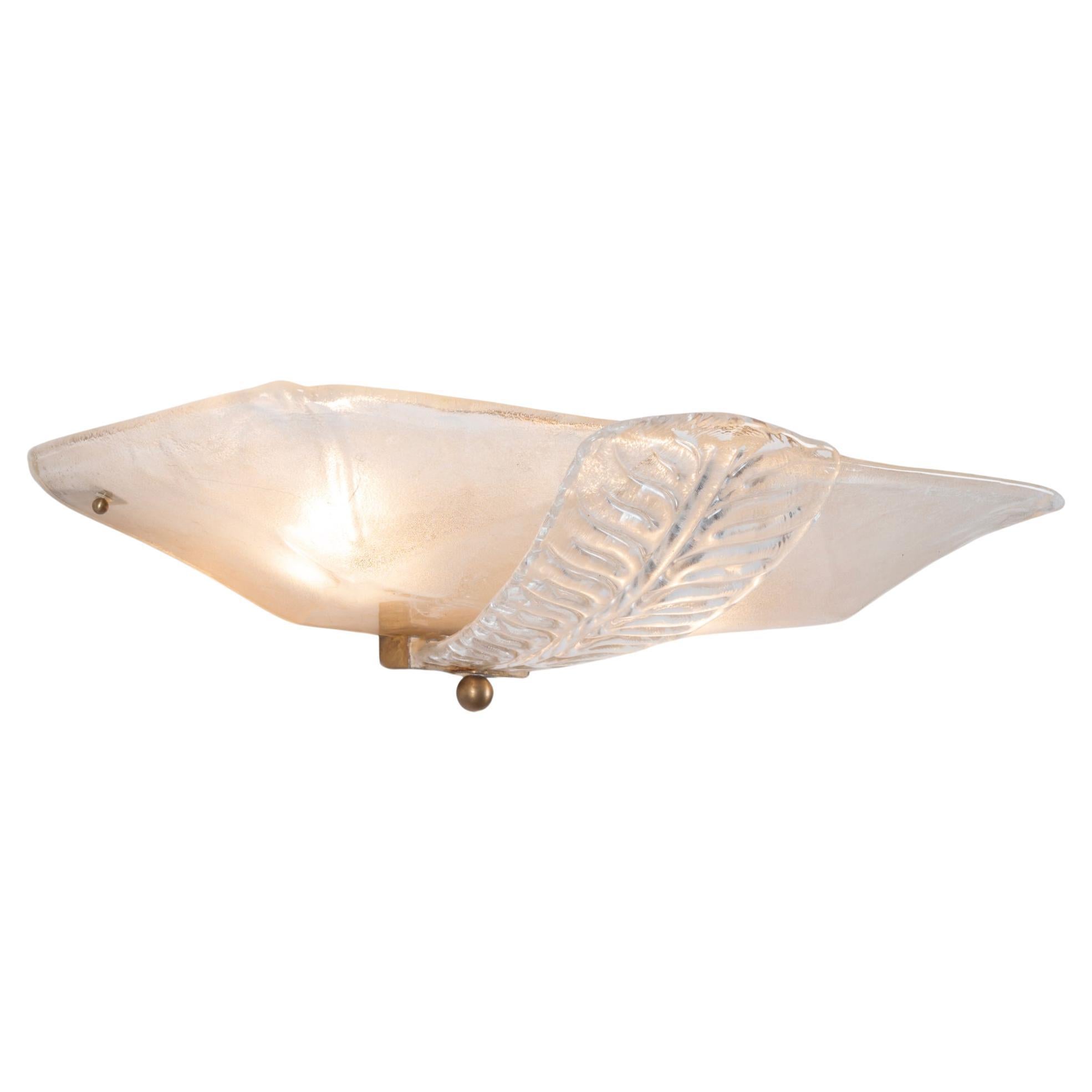
Rare pair of large two-light wall lamps with a brass structure and dew Murano glass diffusers. They were designed and hand-crafted in Italy in the 1930s by Ercole Barovier, a noted figure in the Art Deco Murano glass movement. The sconces are