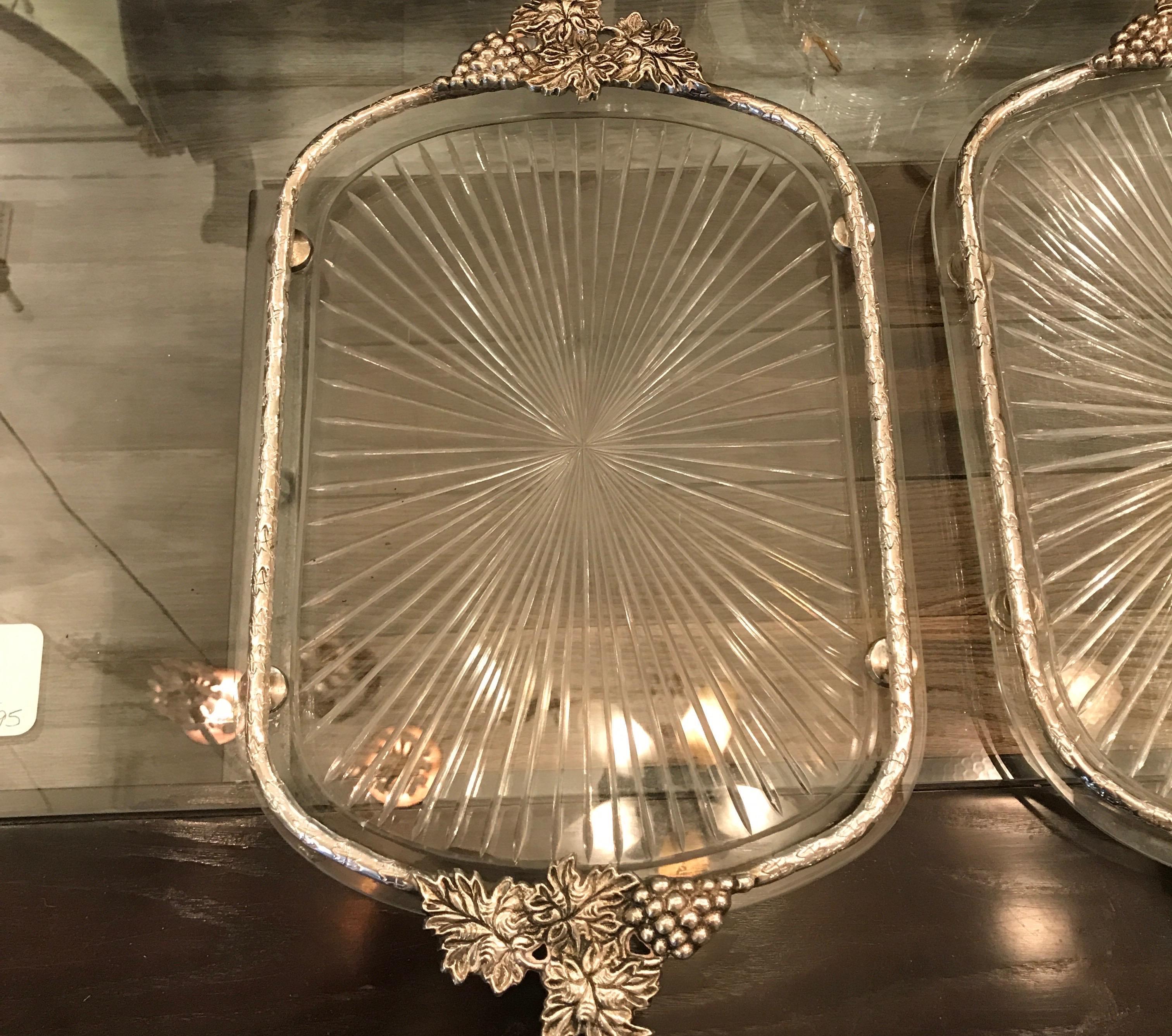 A pair of cut glass and silverplate mounted gallery trays. 16.5 by 10.5 and can be used for food service or vanity trays.