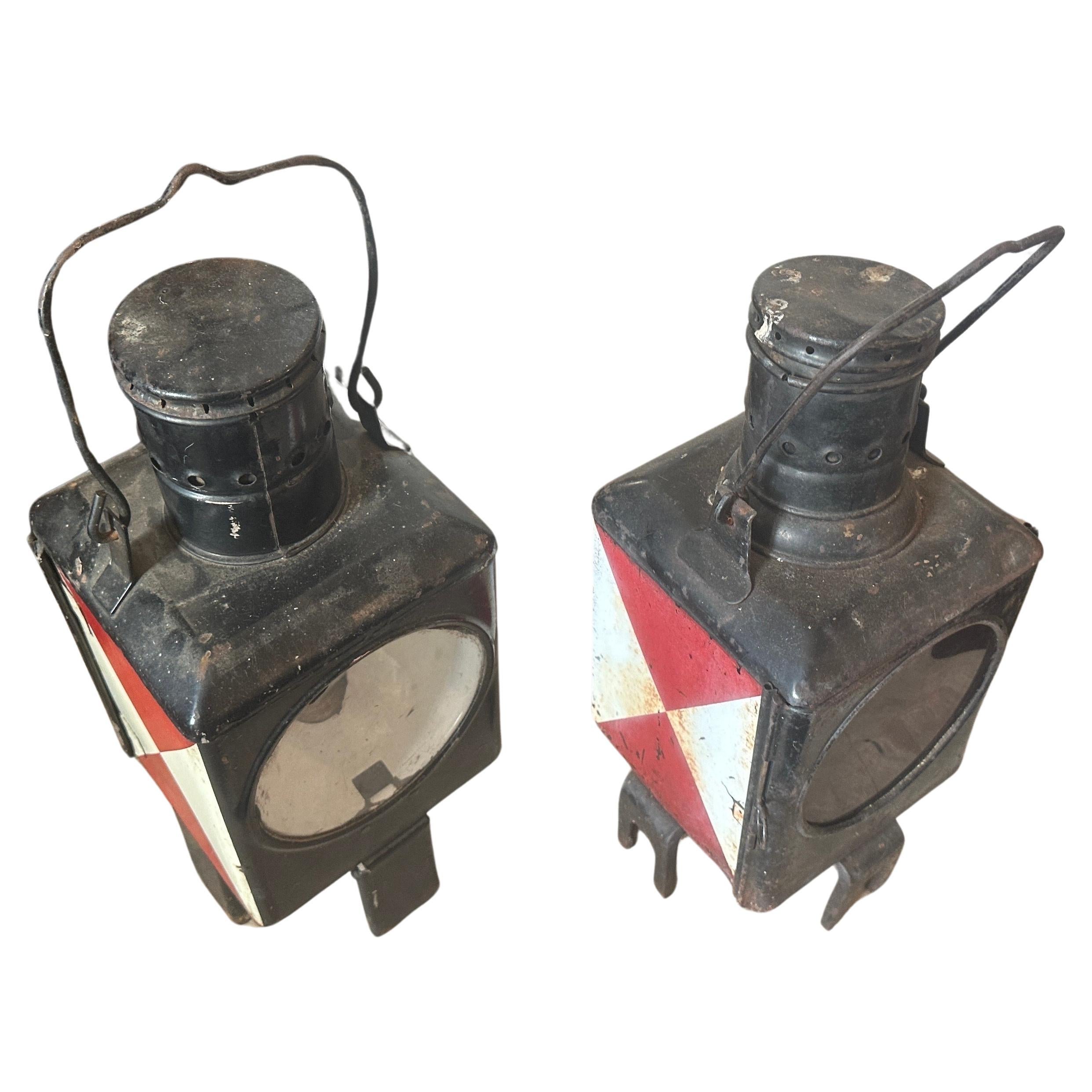 Two railways lanterns manufactured in Germany in the Thirties and used for railways signals. They are in original conditions and can be easily electrified and used. The frame of the lantern is made of iron, a common material for lanterns in the