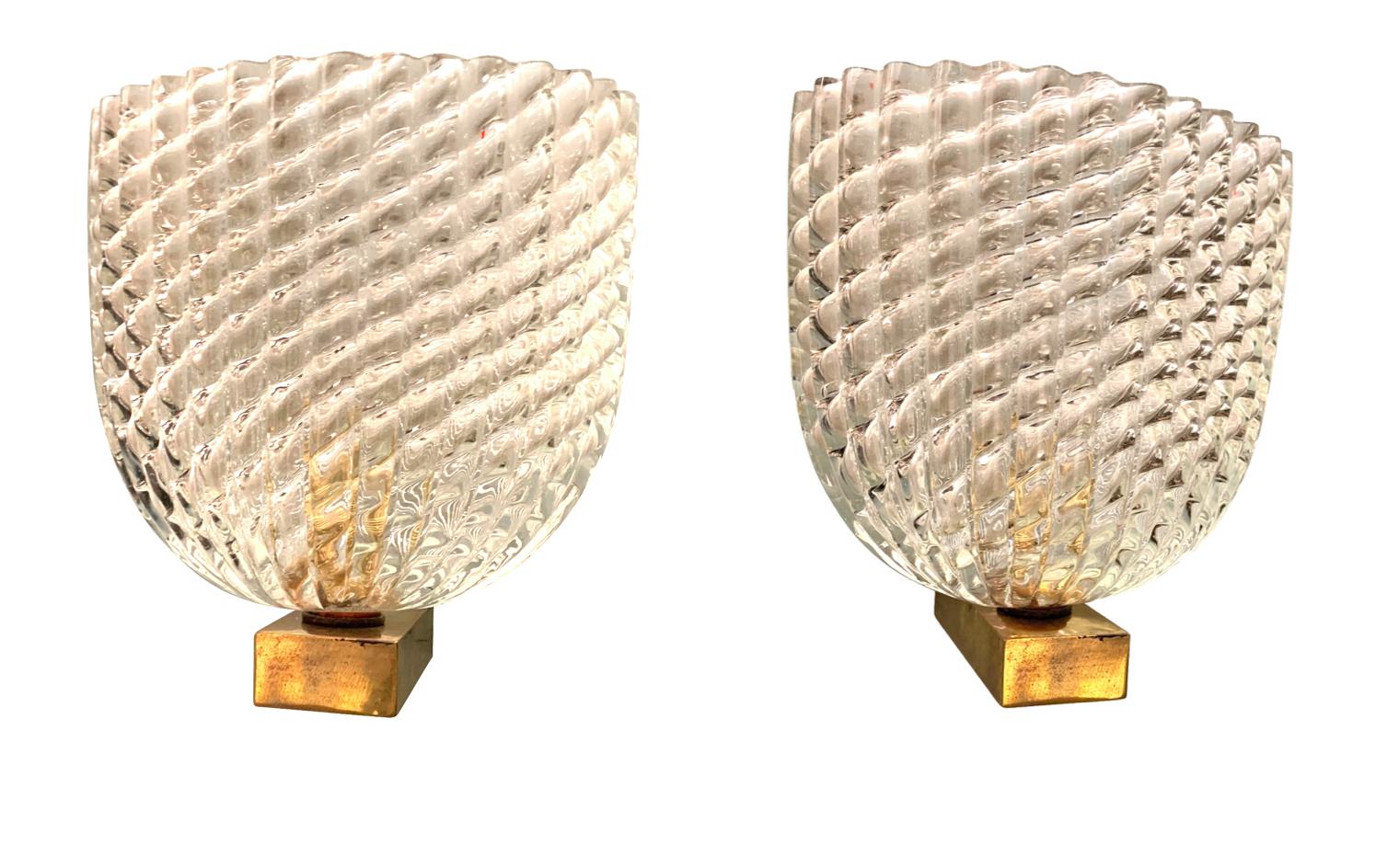 A stunning pair of 1940s Barovier & Toso glass wall sconces with ribbed glass shades mounted on a solid brass arm, with single bulb fitting re-wired and PAT tested. Two pairs available the listed price is for a pair.