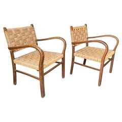 A pair of 1940s French bentwood woven chairs in the style of Erich Dieckmann