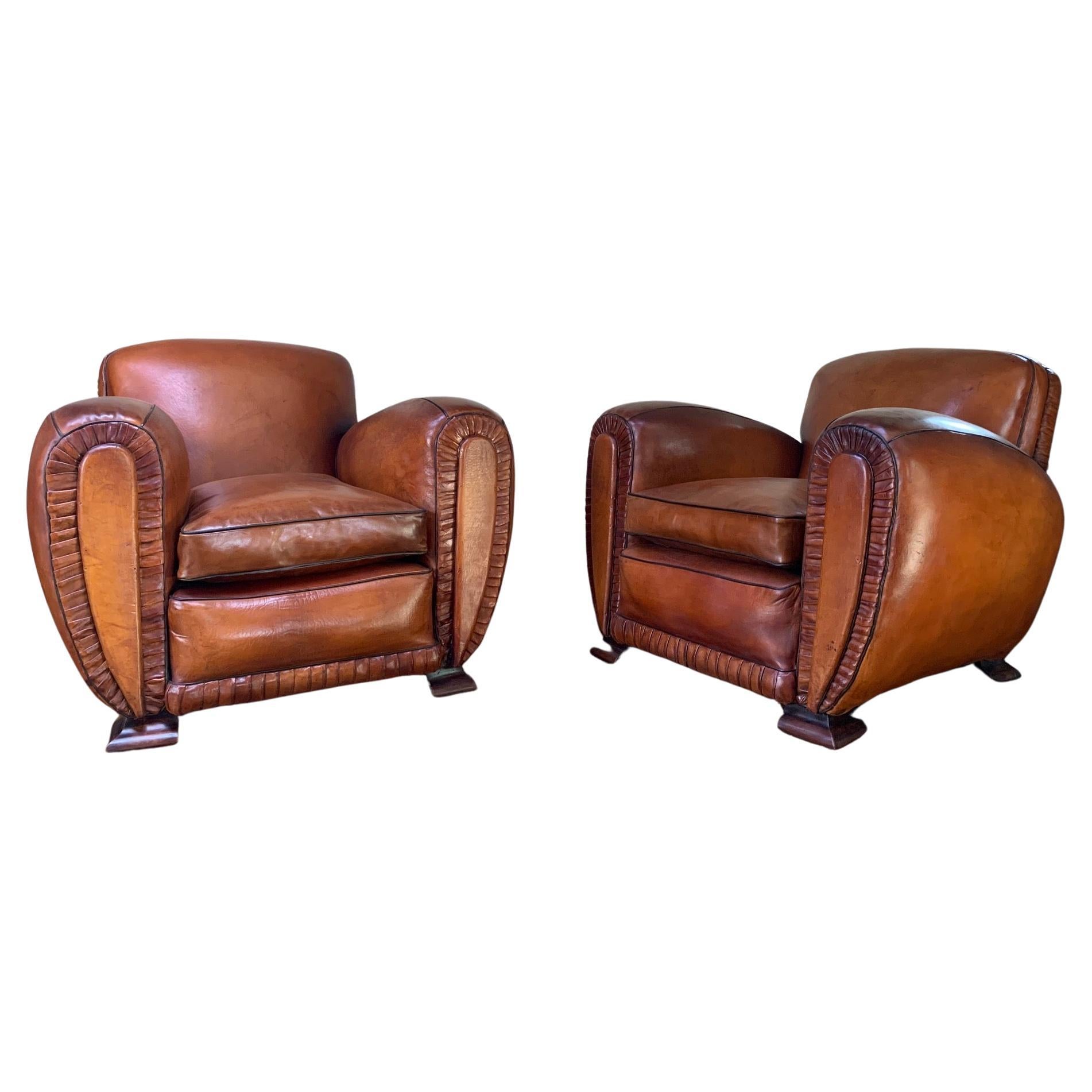A Pair of 1940’s French Leather club Chairs, La Crème de la Crème 