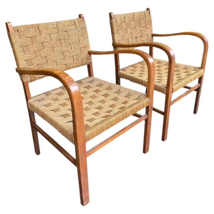 A pair of 1950s bentwood and rope chairs in the style of Erich Dieckmann