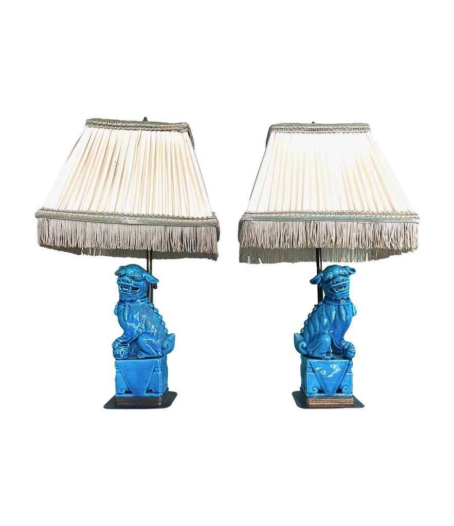 A pair of 1950s ceramic foo dog lamps on decorative brass base 6