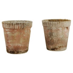 a pair of 1950
s concrete jardinières/planters ...