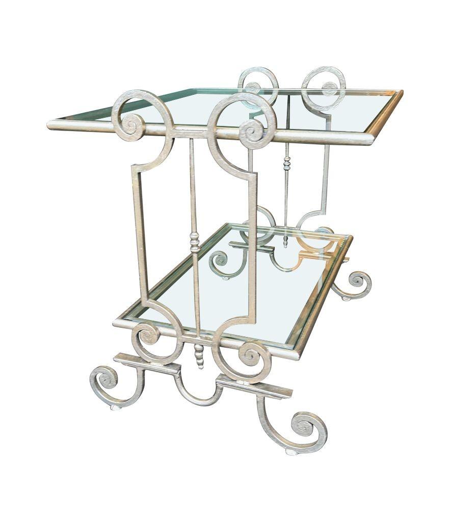 Mid-20th Century A pair of 1950s gilt wrought iron French side tables, with glass shelves For Sale