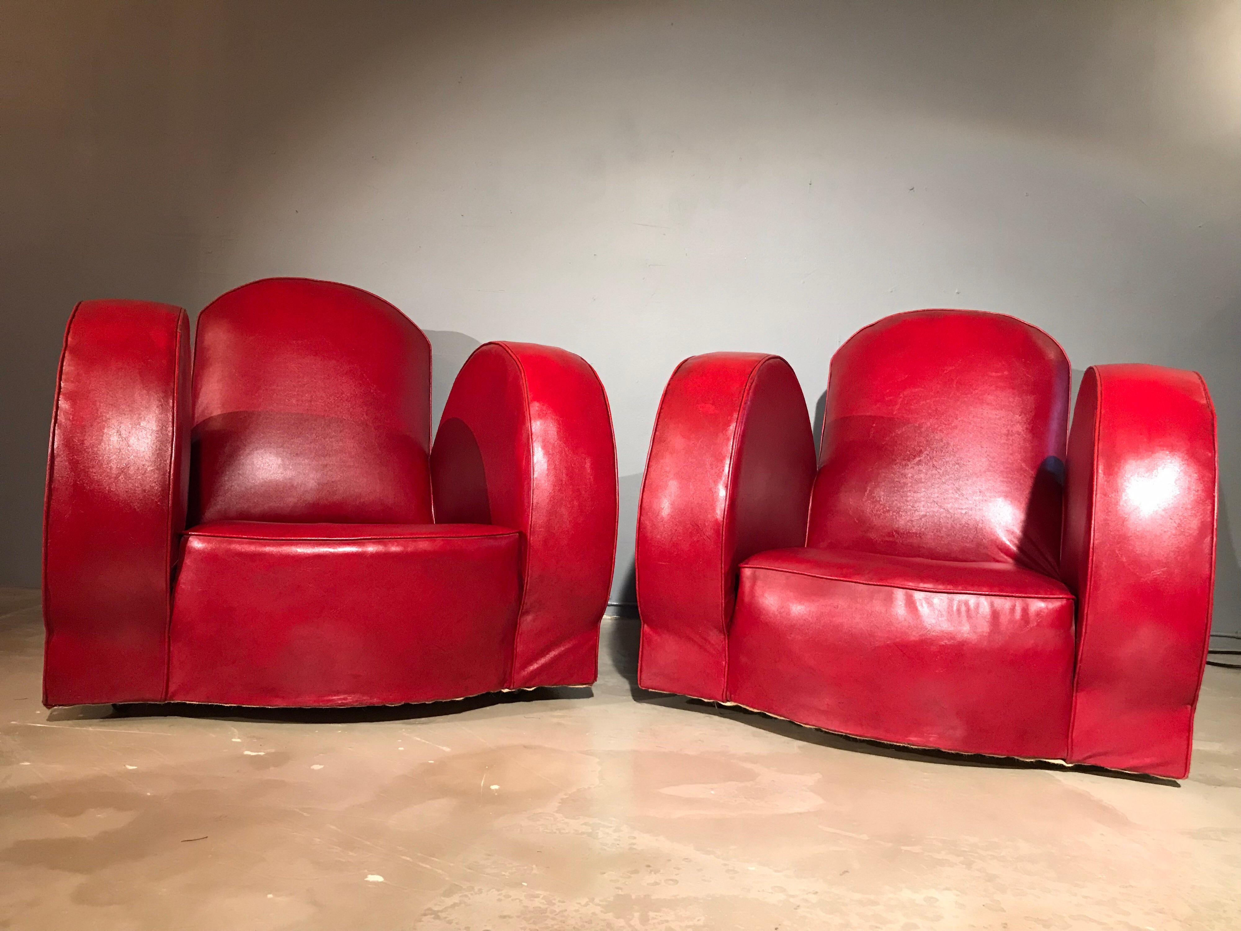 A pair of stunning lounge chairs in faux leather.
Extreme Brutalist design with a hint of Art Deco.
With the original covers mounted onto an oak frame
These chairs are starting to show their age but this just enhances the look
The oak frames are