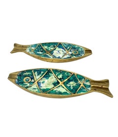 A pair of 1950s malachite and brass fish ashtrays by Pepe Mendoza