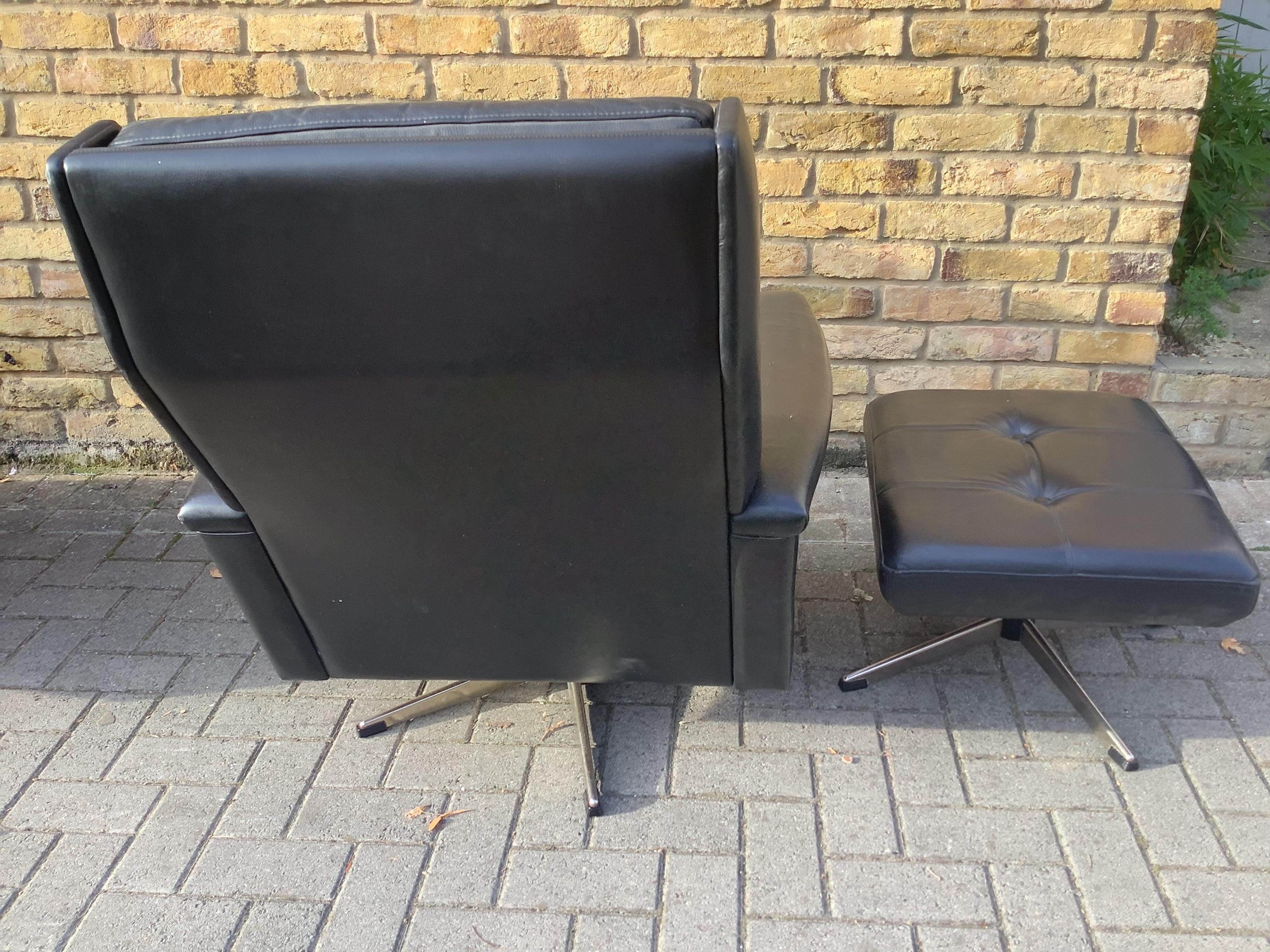 A pair of 1950’s restored  armchairs 1