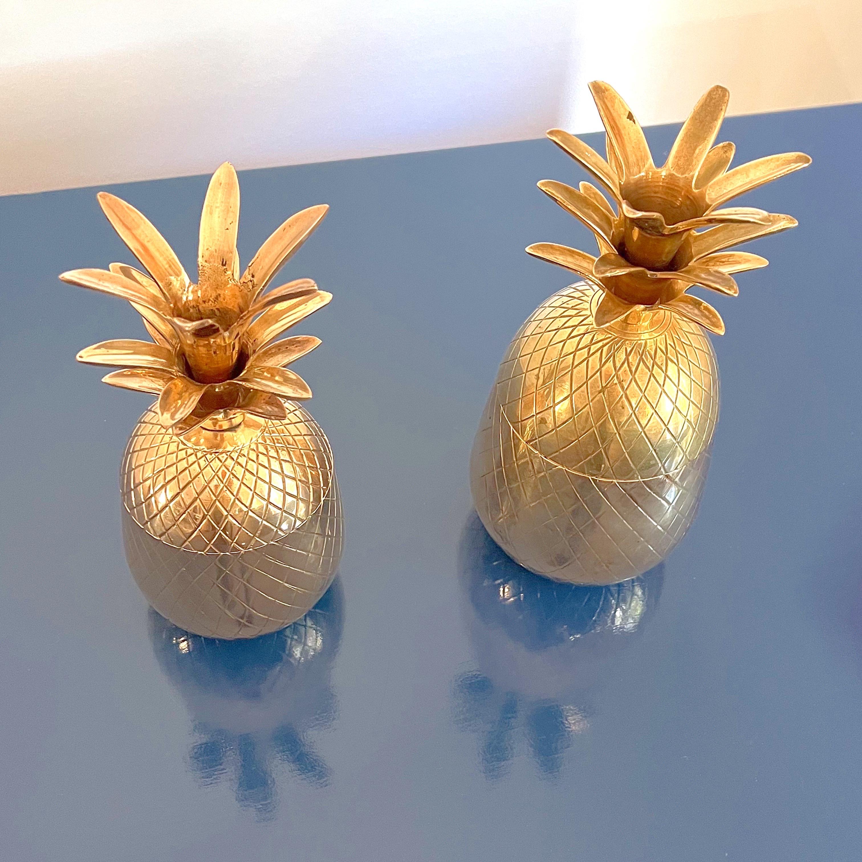 Here we have a set of two vintage brass lidded pineapple containers, one still carrying the older style Handmade in India sticker on the bottom. Use to hold jewelry, trinkets, or as classic shelf display in decor from midcentury modern to rustic.