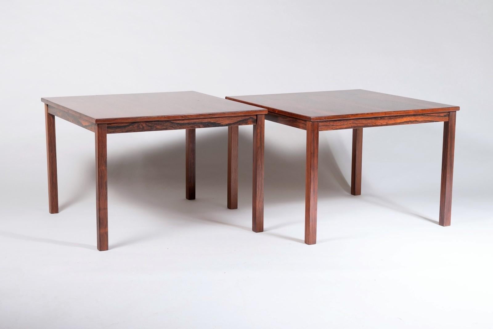 An attractive pair of mid-century Danish coffee tables in rosewood, the tables are matching in size with lovely modern form, square and a good size at 70cm x 70cm, so slightly larger than the usual 60cm which makes these pair very appealing to those