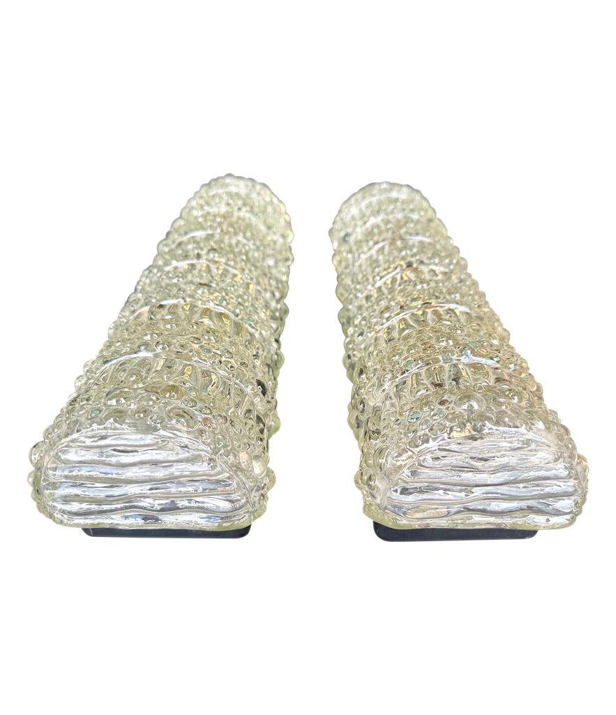 Mid-20th Century A pair of 1960s clear geometric textured glass wall lights For Sale