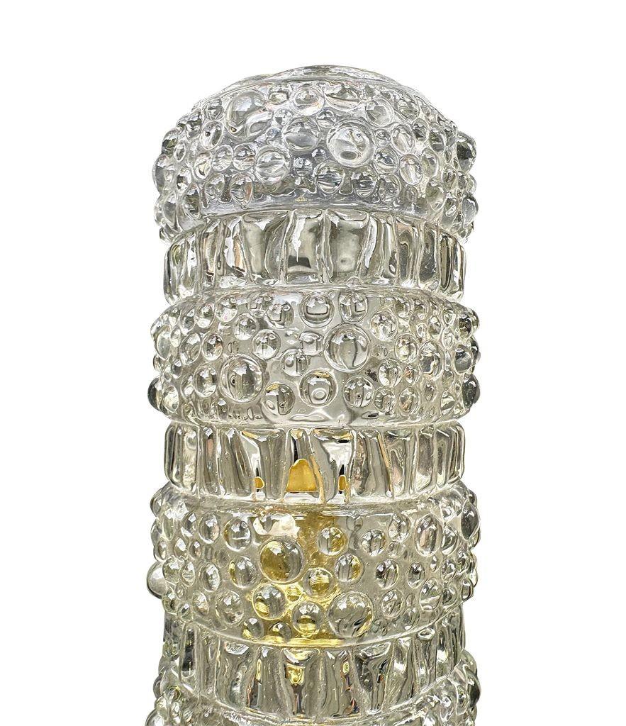 A pair of 1960s clear geometric textured glass wall lights For Sale 1
