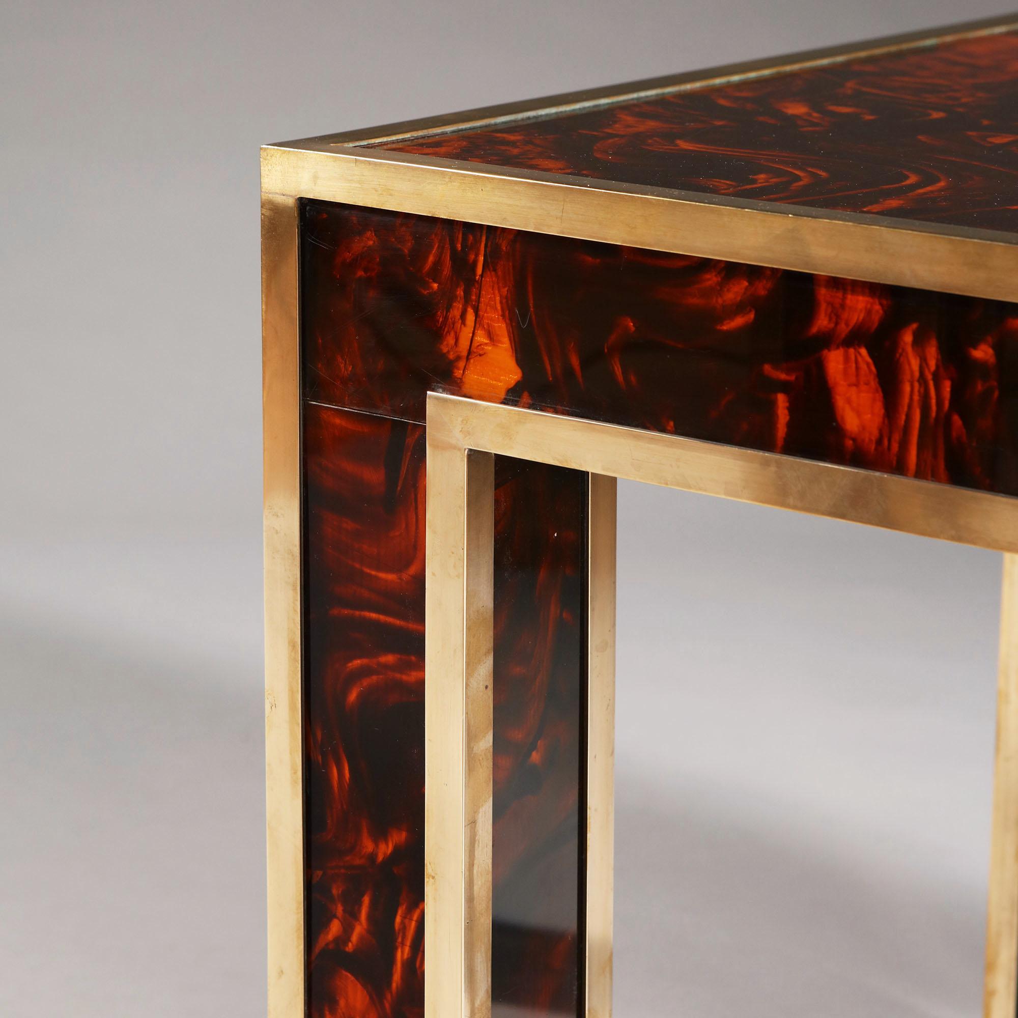 A pair of 1960s faux tortoiseshell square occasional tables with brass edges, after Maison Jansen.