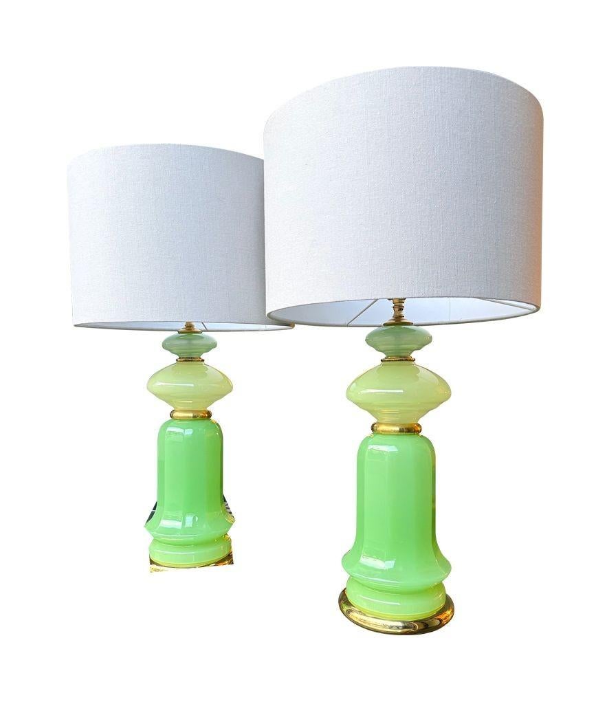 Italian A pair of 1960s Murano glass green opaline lamps with brass base and fittings