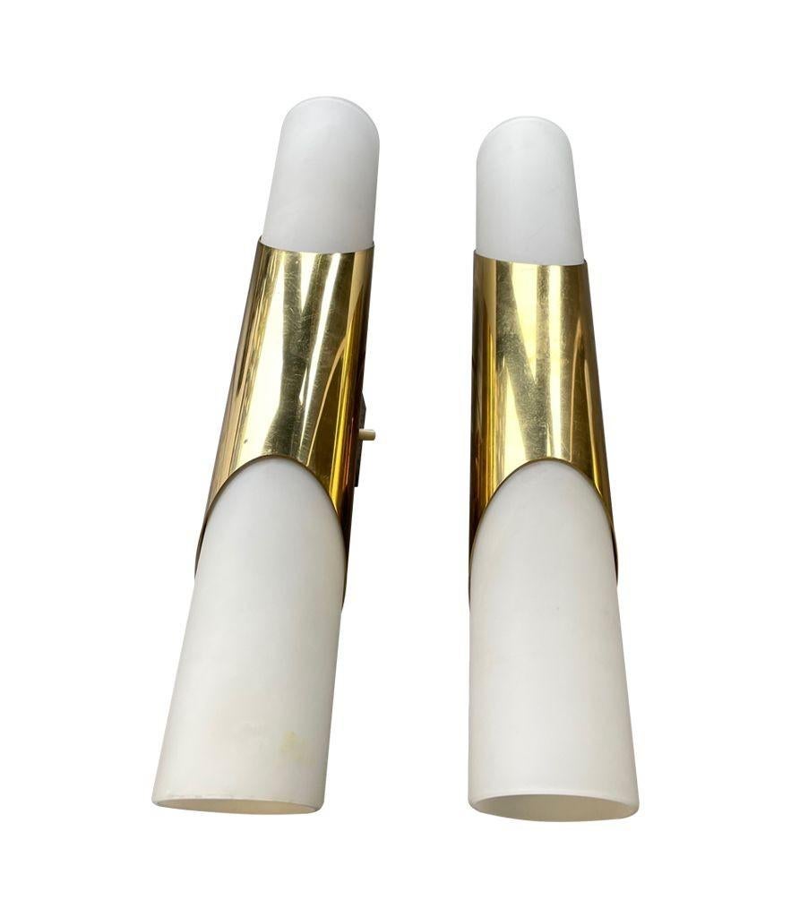 Mid-20th Century A pair of 1960s Neuhaus Leuchten white oplaine and brass wall sconces For Sale