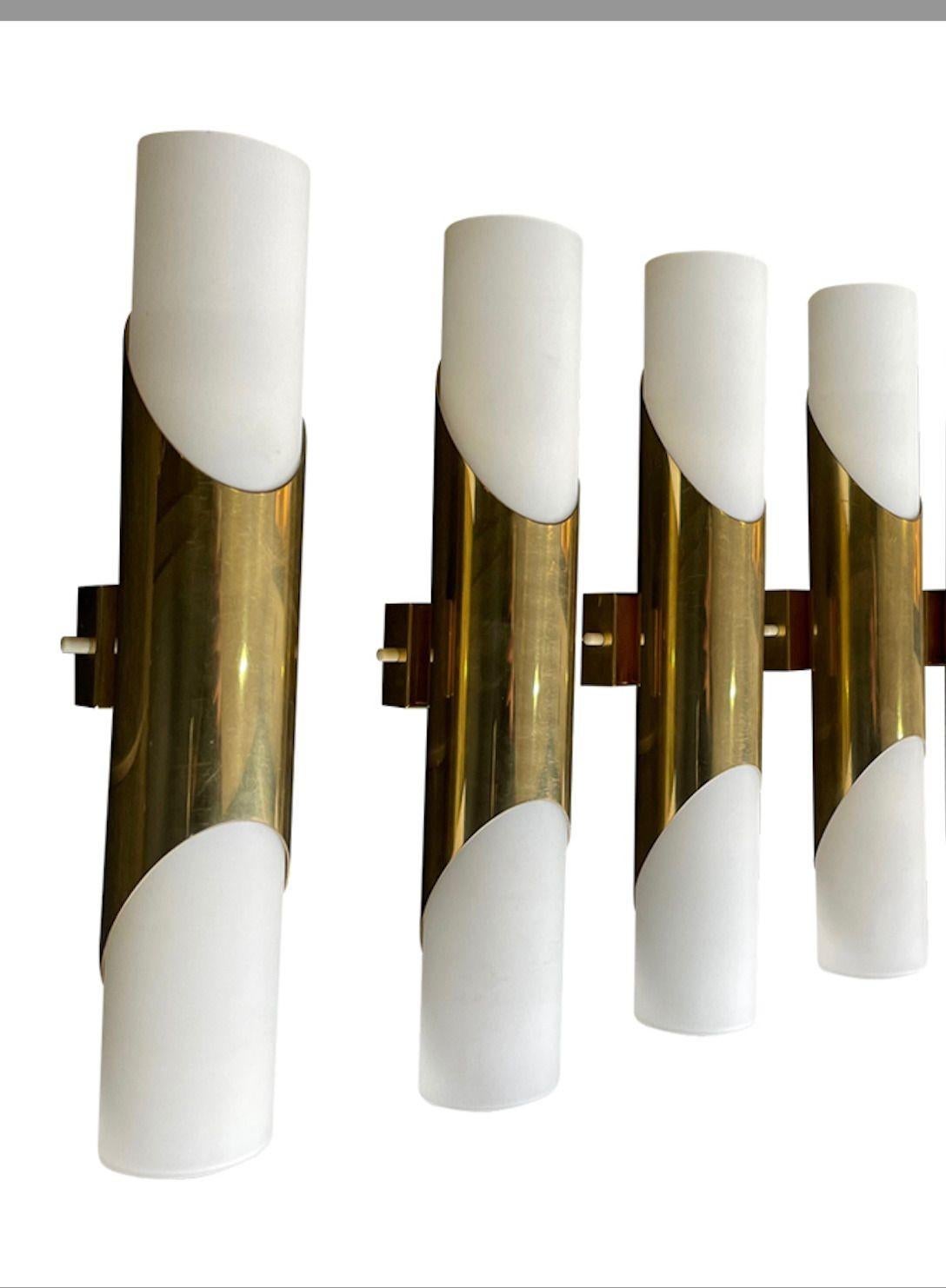 A pair of 1960s Neuhaus Leuchten white oplaine and brass wall sconces For Sale 1
