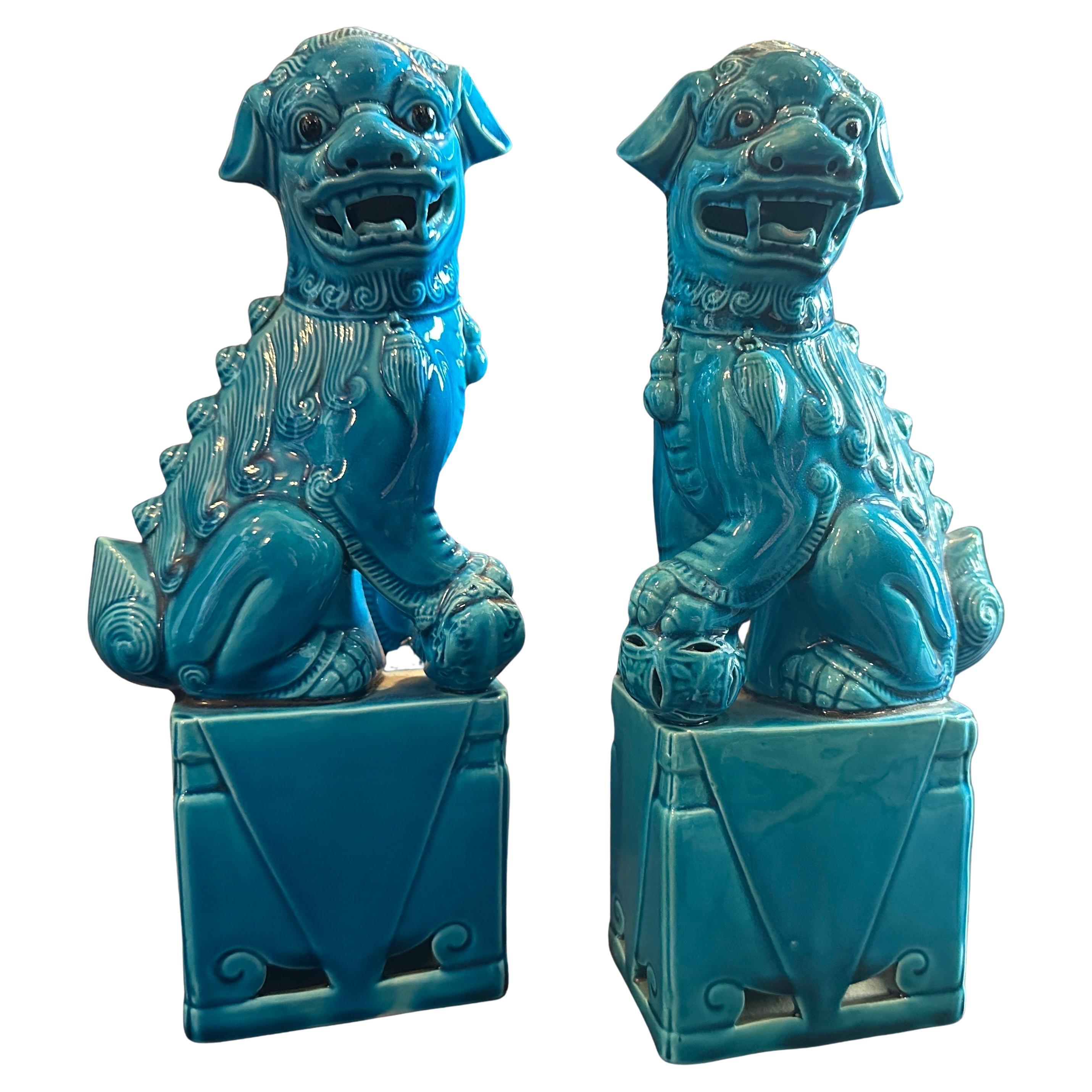 A pair of 1960s Turquoise Glazed Ceramic Chinese Pho Dogs For Sale