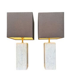 A pair of 1970s Belgian Carrera marble lamps by Porcelaine de Bruxelles