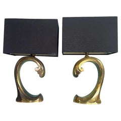 A pair of 1970s brass wave lamps by Belgium lighting company Regina