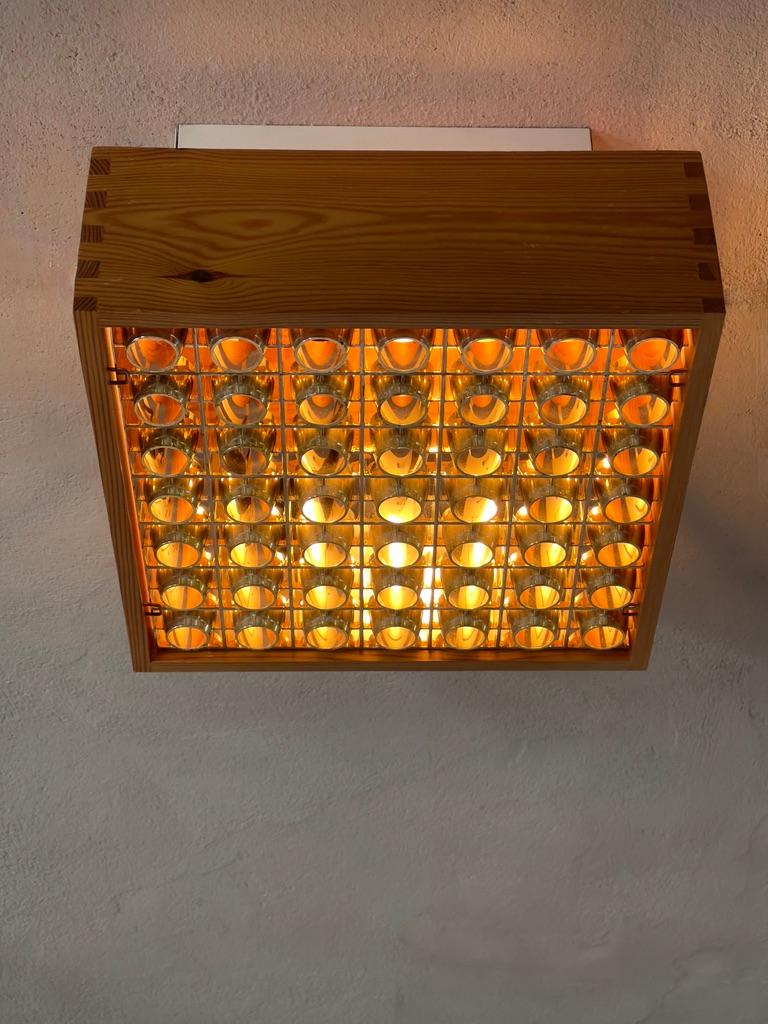 Joinery A pair of 1970s danish ceiling lights in patinated finger-jointed pine. (2)