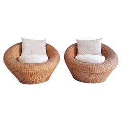 A Pair of 1970's French Round Rattan Lounge Chairs