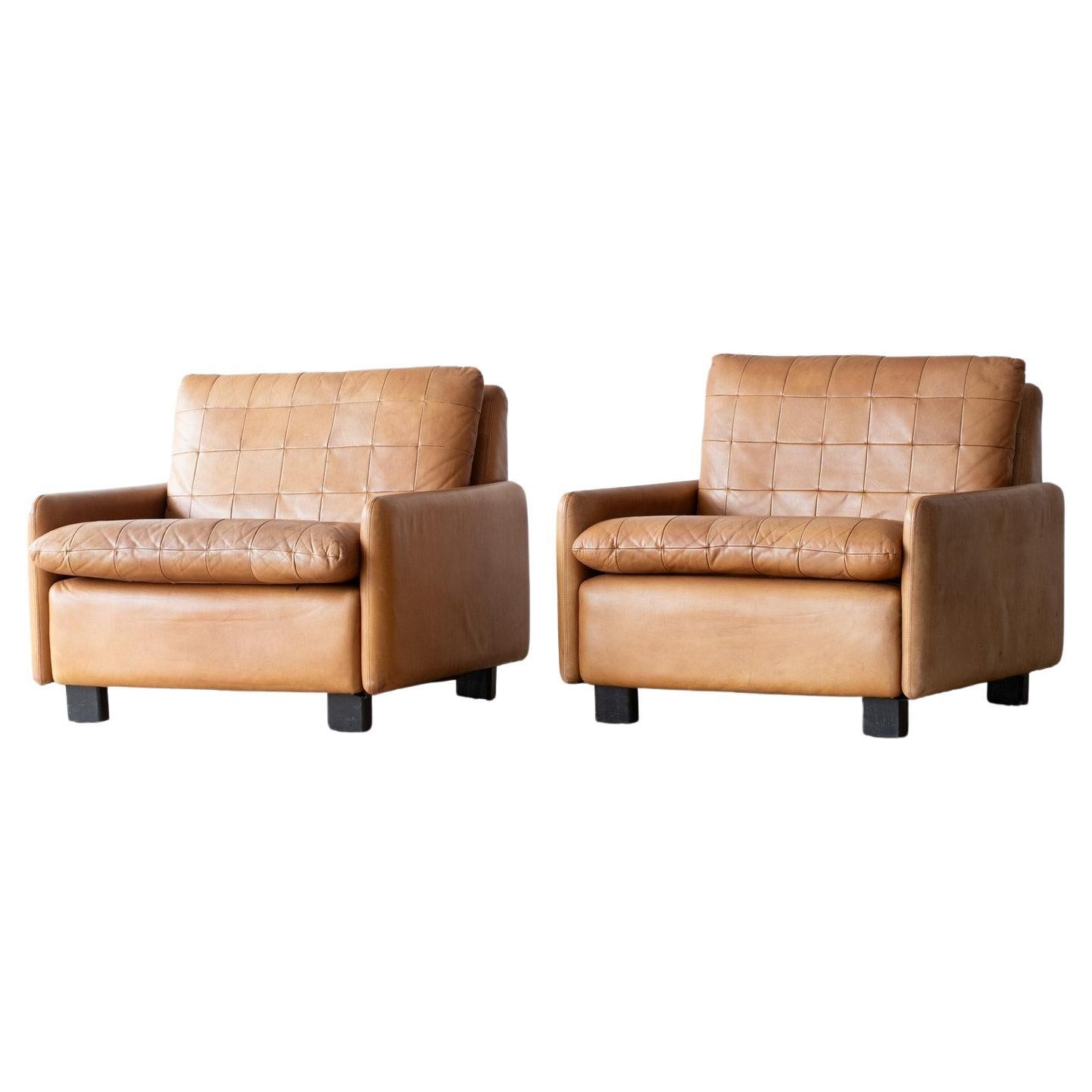 A Pair of 1970s Italian Mid Century Patchwork Tan Leather Club Armchairs For Sale