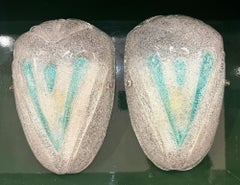 A pair of 1970s Italian Murano glass wall sconces with teal green detail