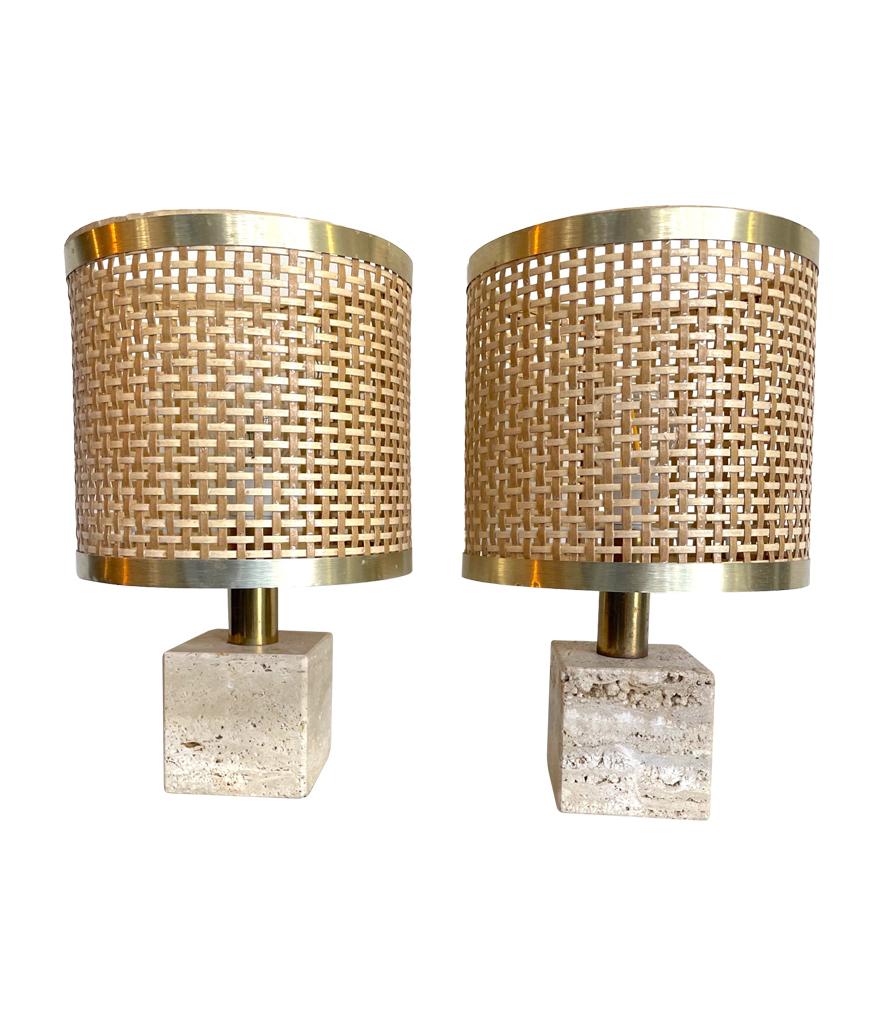 A pair of 1970s Italian travertine lamps by Fratelli Mannelli, re-wired with new brass fittings, antique cord flex and PAT tested. Both with orignal rattan shades with brass edging.