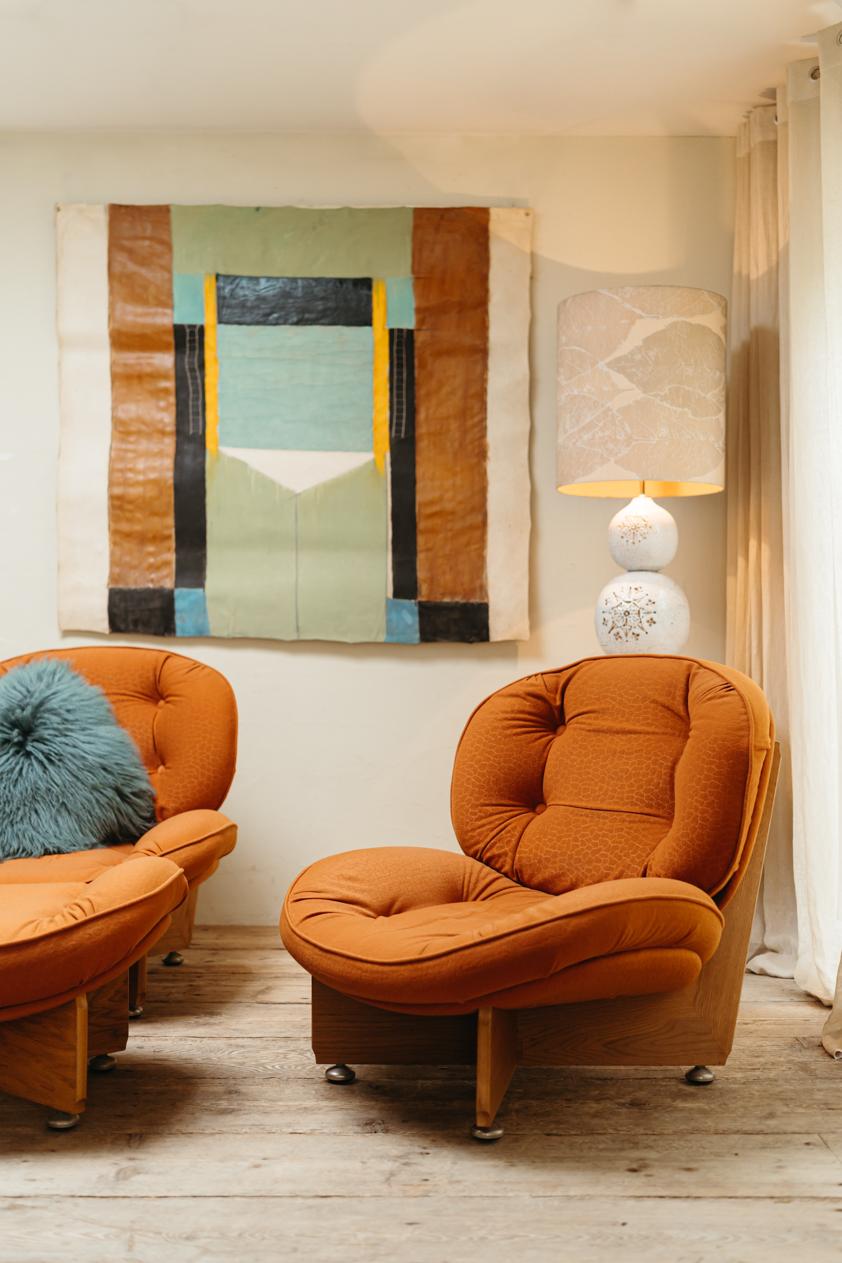 a pair of 1970's lounge chairs and one ottoman/pouf 8