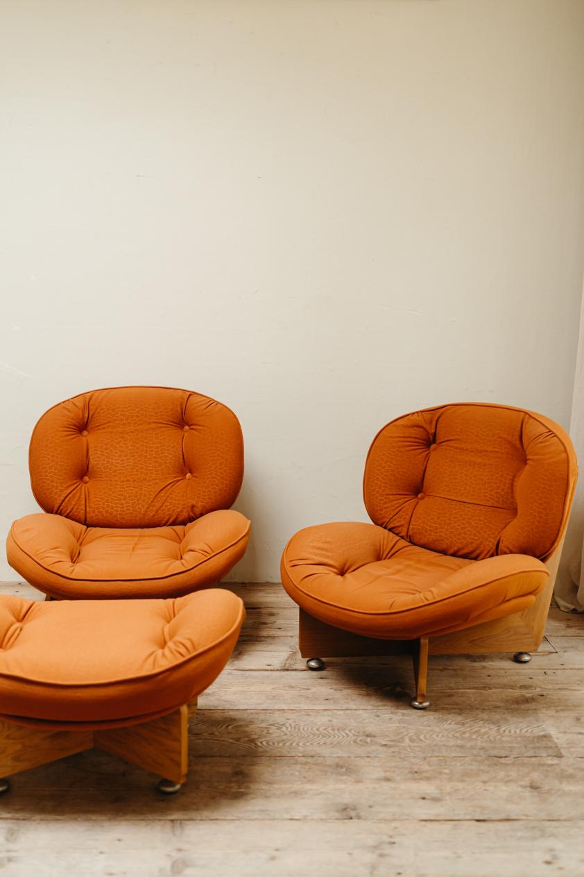 a quirky pair of 1970's wood and fabric lounge chairs + one ottoman, 
all original fabric, in very good vintage condition, comfortable and sturdy,
Deep 100 cm x 85 cm wide x 87/44 cm high, dimensions of the ottoman are
80 cm deep x 65 cm wide and 45