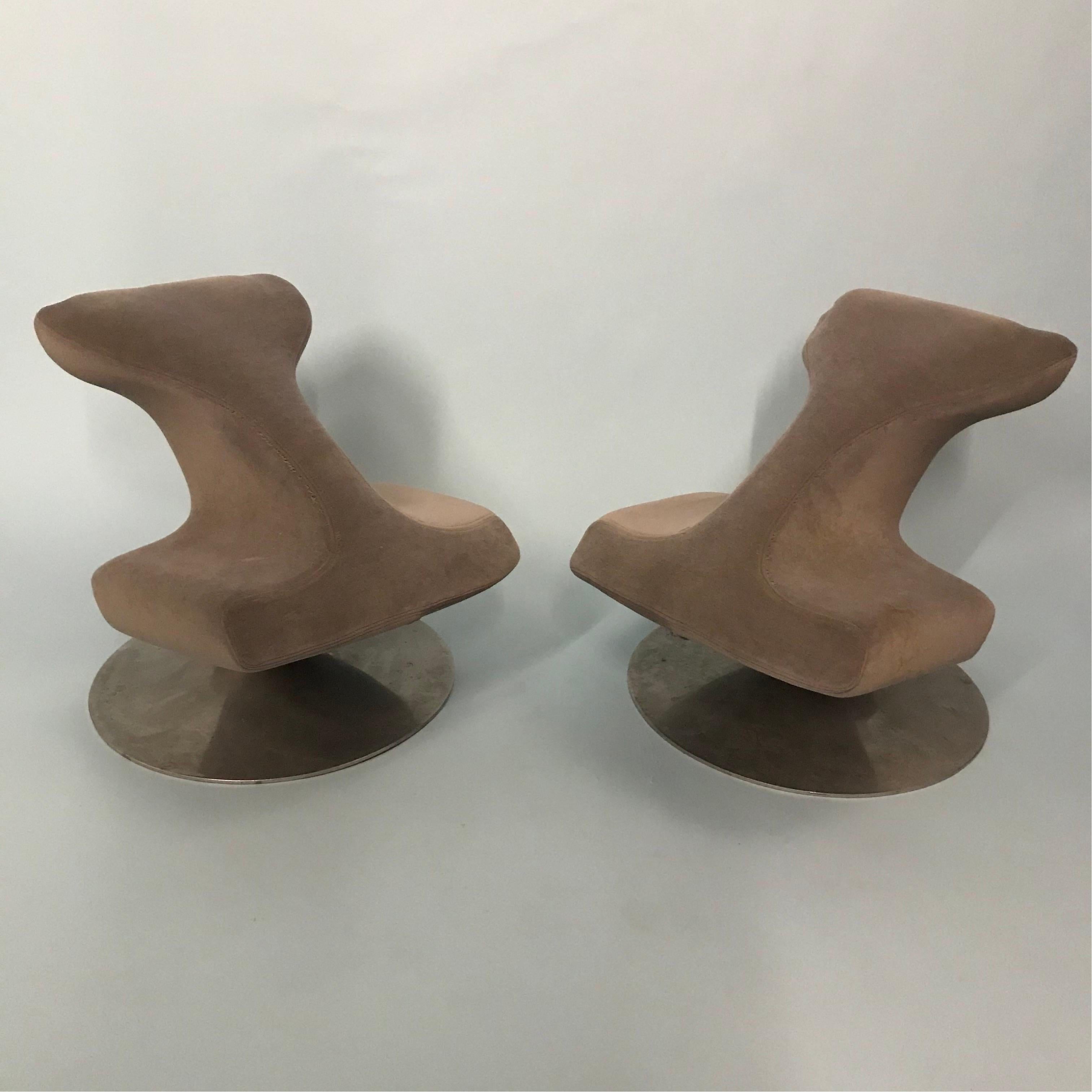 A pair of sculptural 1970’s French Radical kneeling stools attributed to Artifort in vintage unrestored condition retaining grey factory stretch fabric on an injection moulded dense foam seat set on a sturdy inner steel skeleton over a turned