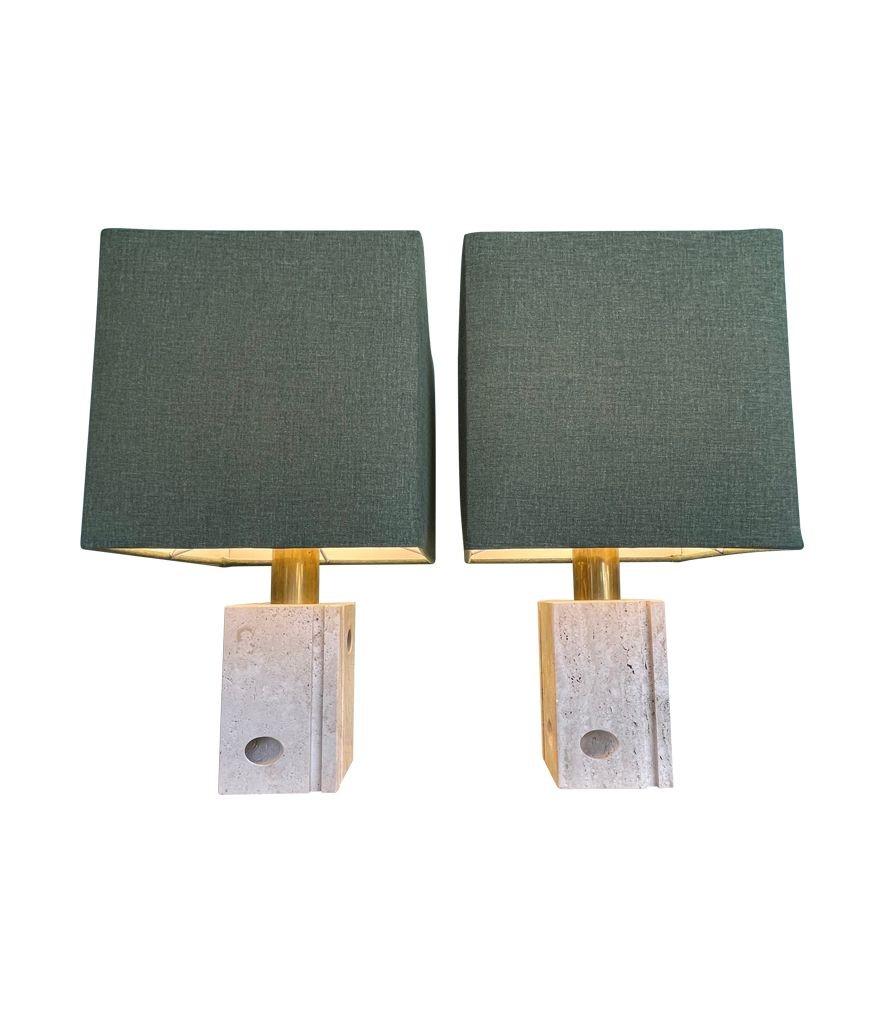 A pair of 1970s Italian travertine lamps with sculptural groove and hole designs by Fratelli Mannelli. Re wired with new brass fittings, antique gold cord flex and switch.
2 pairs available, The price is for the pair with shades