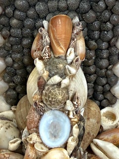 Una coppia di reggilibri in conchiglia degli anni '70