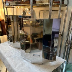 A pair of 1980s Modern Steel Italian Ambient Light Wall Sconces