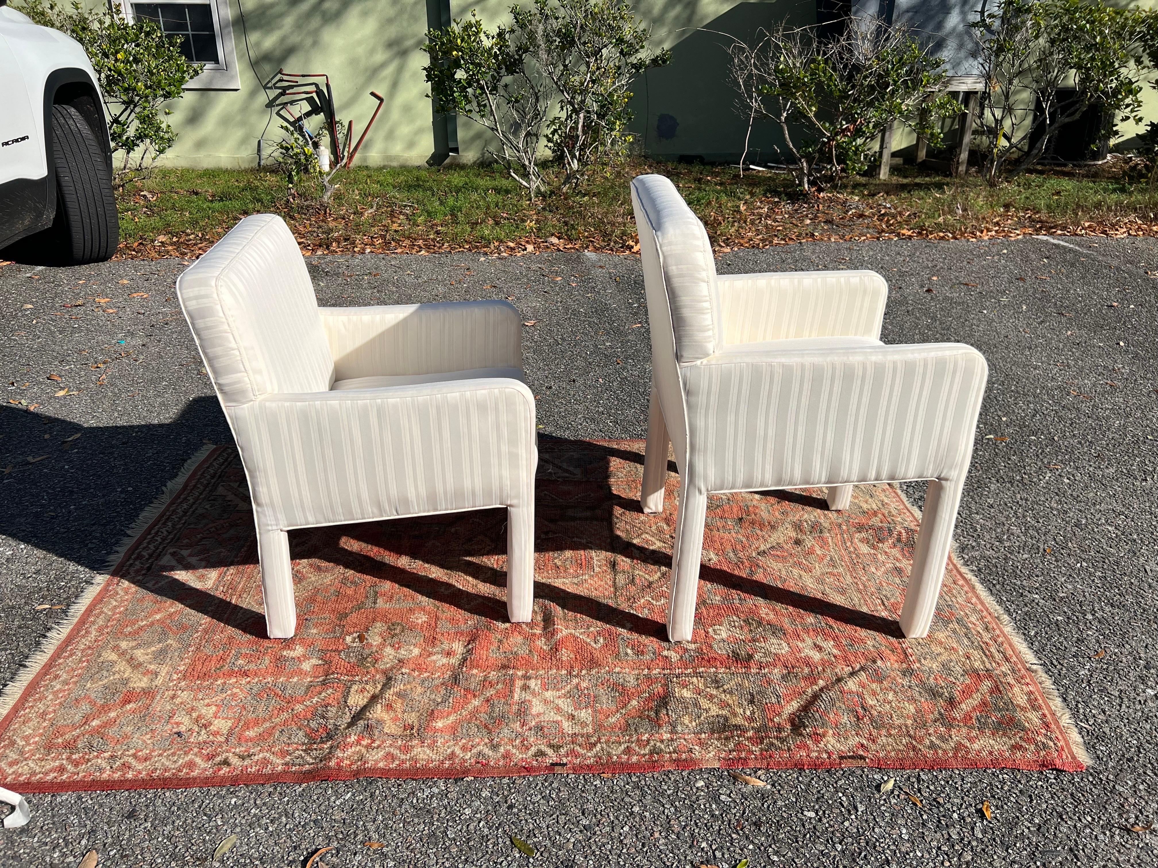A pair of 1980s Postmodern His and Hers Low Back Parsons Chairs In Good Condition For Sale In Charleston, SC